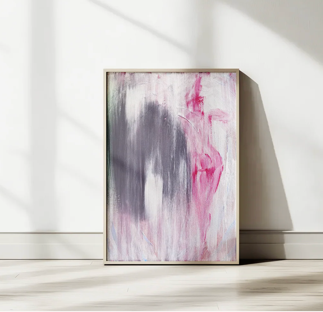 Abstract pink and grey painting in a frame